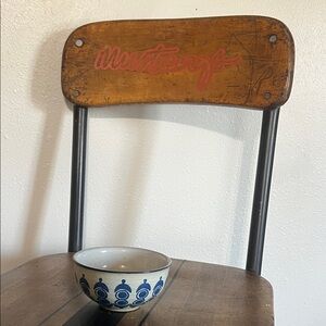 Handmade pottery bowl with blue pattern design